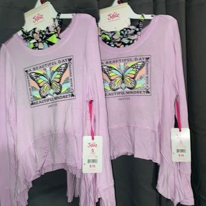 Justice shirt set with Sports bra and hair tie.